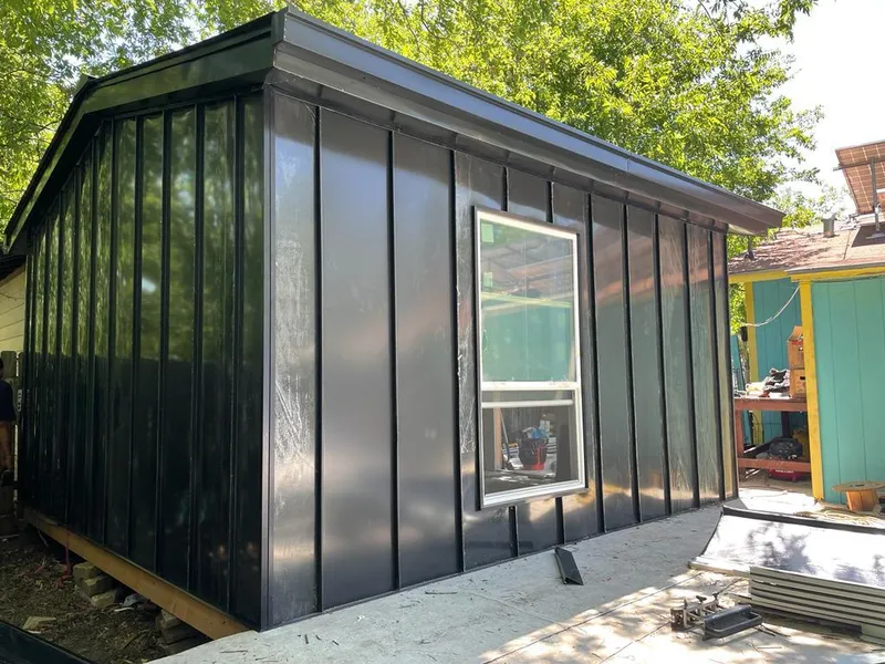 Black standing seam metal wall panels for Roof Inspection in Lutherville